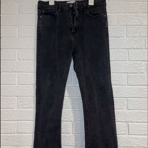 black high-waisted flare pants, frayed at the end